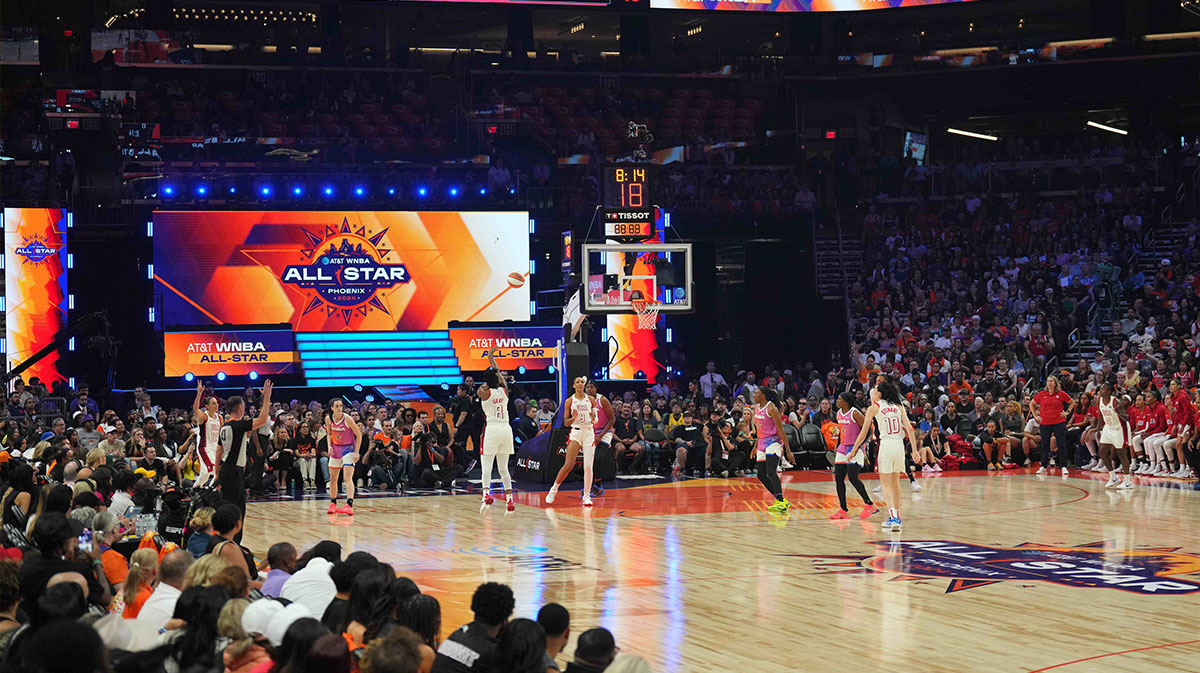 USA Women's National Team guard Chelsea Gray shoots against the Team WNBA during the WNBA All Star Game at Footprint Center.