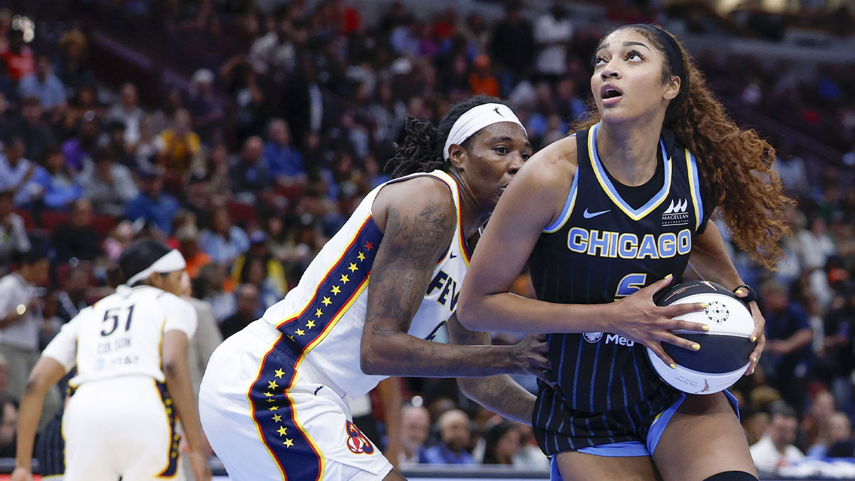 Jun 7, 2025; Chicago, Illinois, USA; Chicago Sky forward Angel Reese (5) drives to the basket against Indiana Fever forward Natasha Howard (6) during the second half of a WNBA game at United Center. Mandatory Credit: Kamil Krzaczynski-Imagn Images