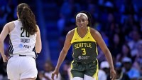Dallas Wings forward Maddy Siegrist (20) and Seattle Storm forward Nneka Ogwumike (3) in action during the game between the Dallas Wings and the Seattle Storm at College Park Center.