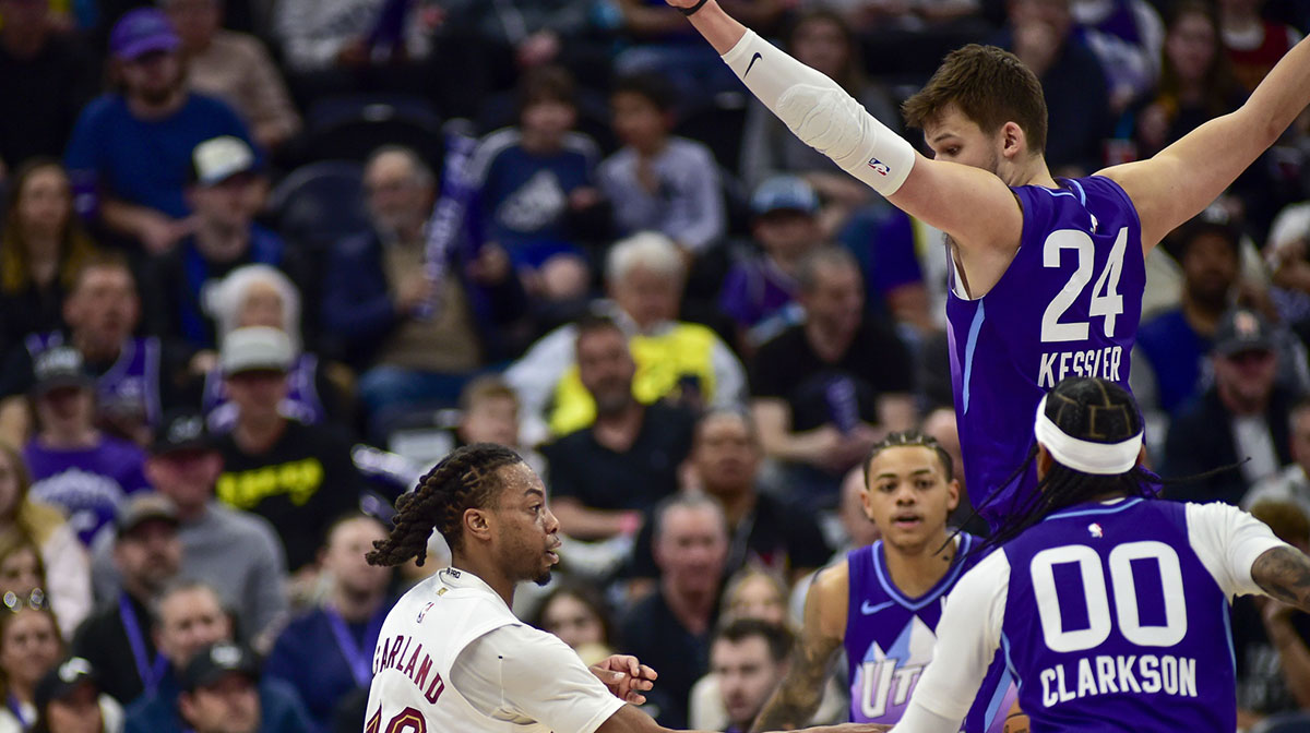 Utah Jazz center Walker Kessler (24) makes a block attempt against Cleveland Cavaliers guard Darius Garland (10) during the first half at Delta Center.
