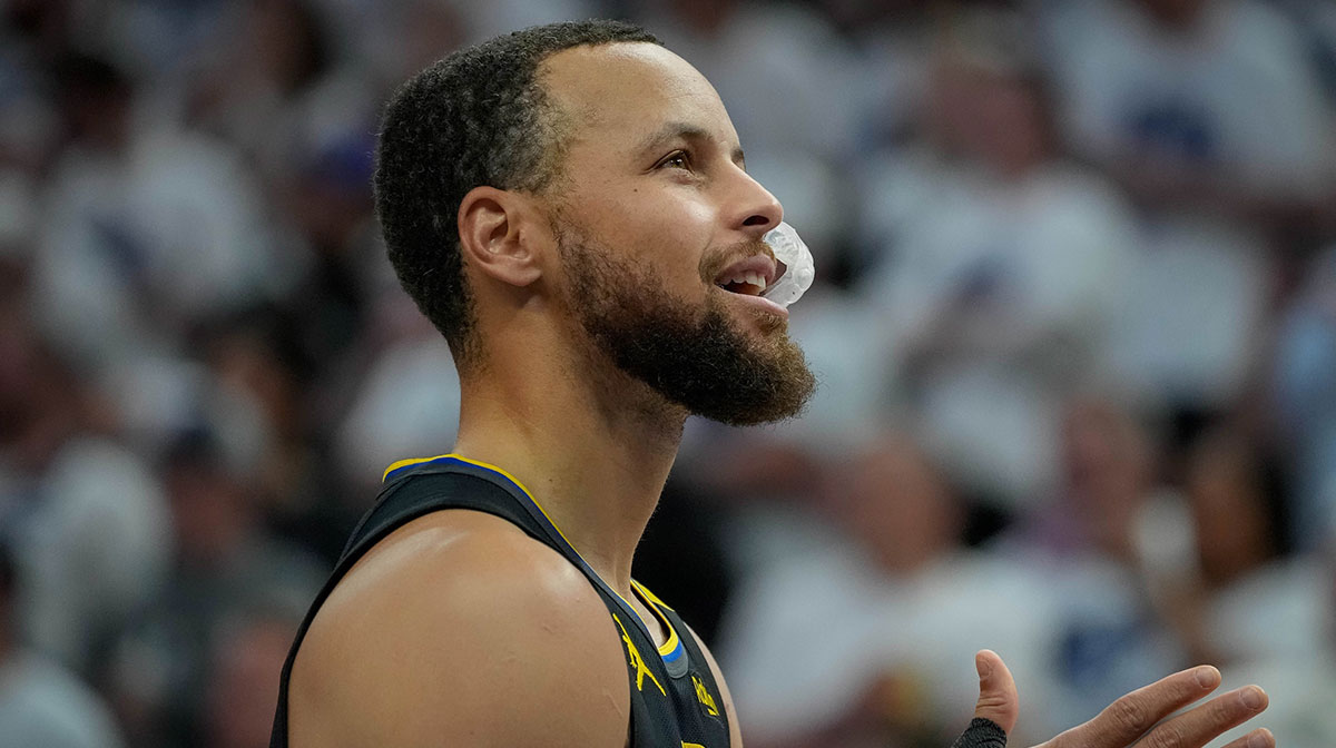 Warriors guard Stephen Curry (30) prepares to play the Minnesota Timberwolves before game one of the second round for the 2025 NBA Playoffs at Target Center