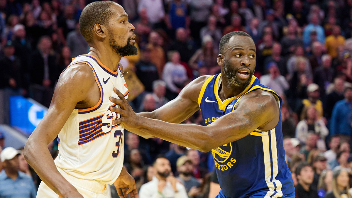 Golden State Warriors forward Draymond Green (23) defends against Phoenix Suns forward Kevin Durant (35) during the fourth quarter at Chase Center.
