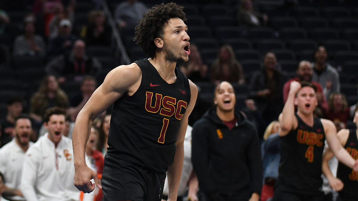USC Trojans guard Desmond Claude (1) celebrates after a play during the second half against the Rutgers Scarlet Knights at Gainbridge Fieldhouse.