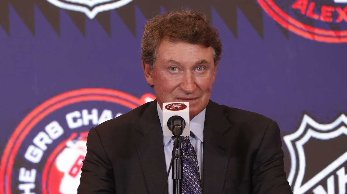 Wayne Gretzky speaks during a press conference with Washington Capitals left wing Alex Ovechkin (not pictured) after the game against the Chicago Blackhawks at Capital One Arena. Ovechkin scored the 893rd and 894th goals of his career, tying Gretzky for most all-time goals in NHL history at Capital One Arena