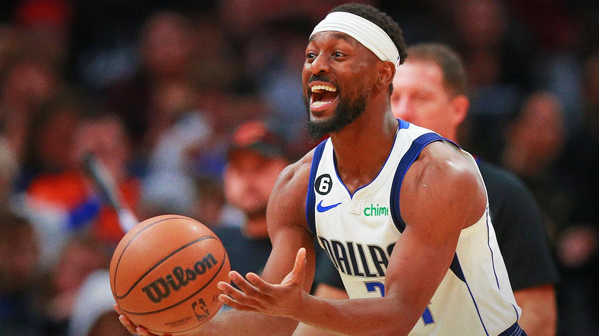 Dallas Mavericks guard Kemba Walker (34) reacts after a foul call during the second half against the Cleveland Cavaliers at Rocket Mortgage FieldHouse.