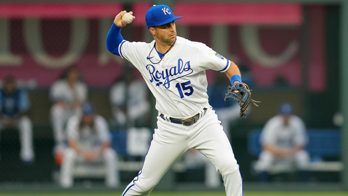 Kansas City Royals second baseman Whit Merrifield (15) throws to first base during the first inning against the Los Angeles Angels at Kauffman Stadium.