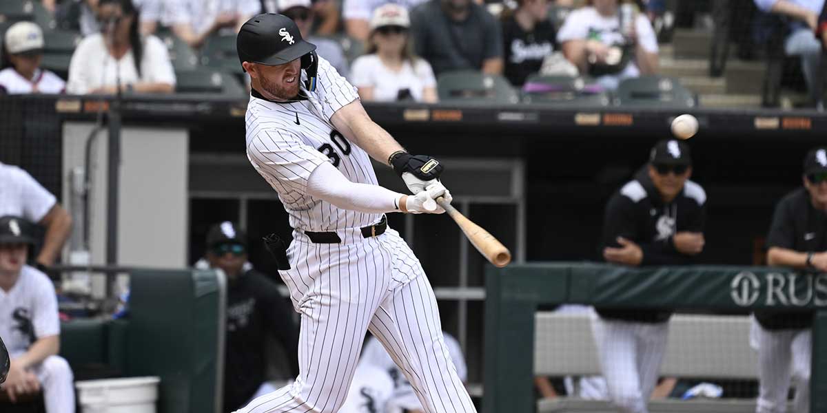 Chicago White Sox first baseman Tim Elko (30) hits a two run home run during the second inning against the Kansas City Royals at Rate Field.