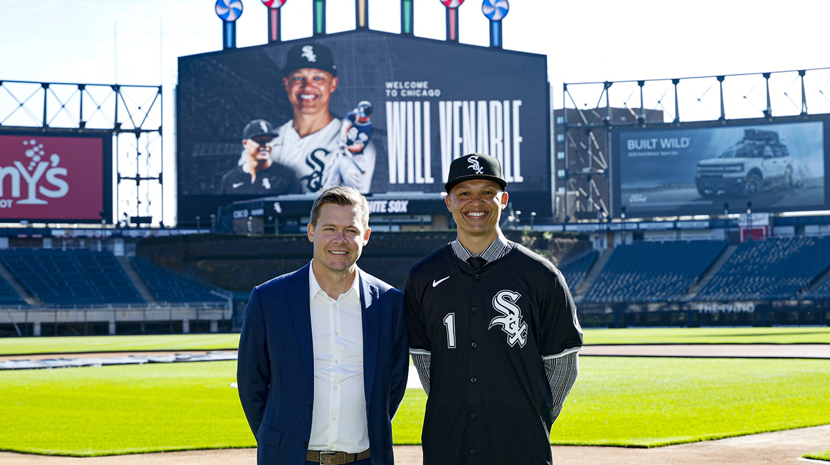 New Chicago White Sox manager Will Venable (R) poses for a photo with general manager Chris Getz (L) at Guaranteed Rate Field.