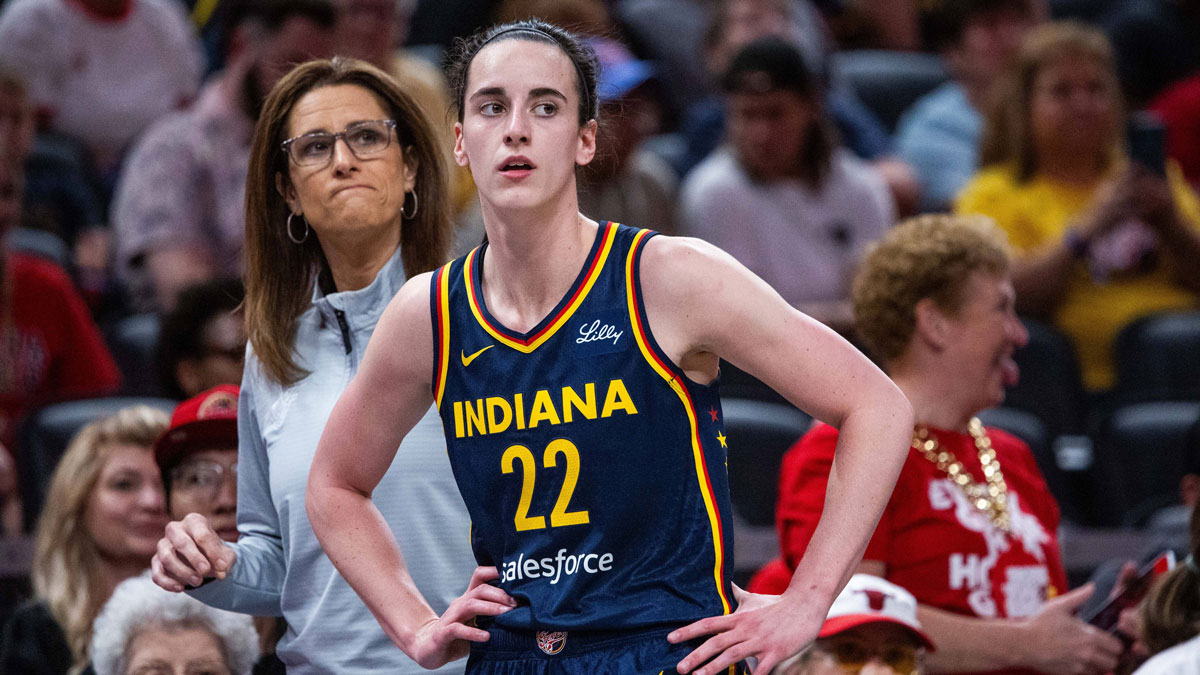 Indiana Fever guard Caitlin Clark (22) and head coach Stephanie White in the first half against the Connecticut Sun at Gainbridge Fieldhouse.