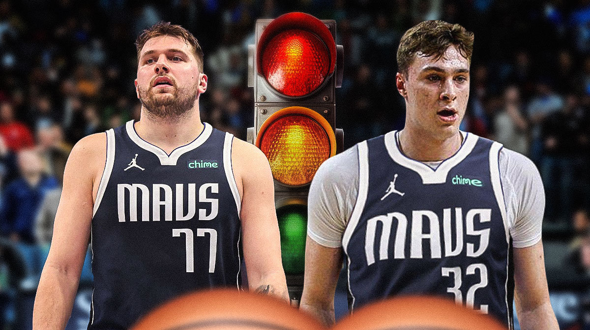 Mavericks Luka Doncic on left, Mavericks Cooper Flagg on right, stop light in the middle on red.