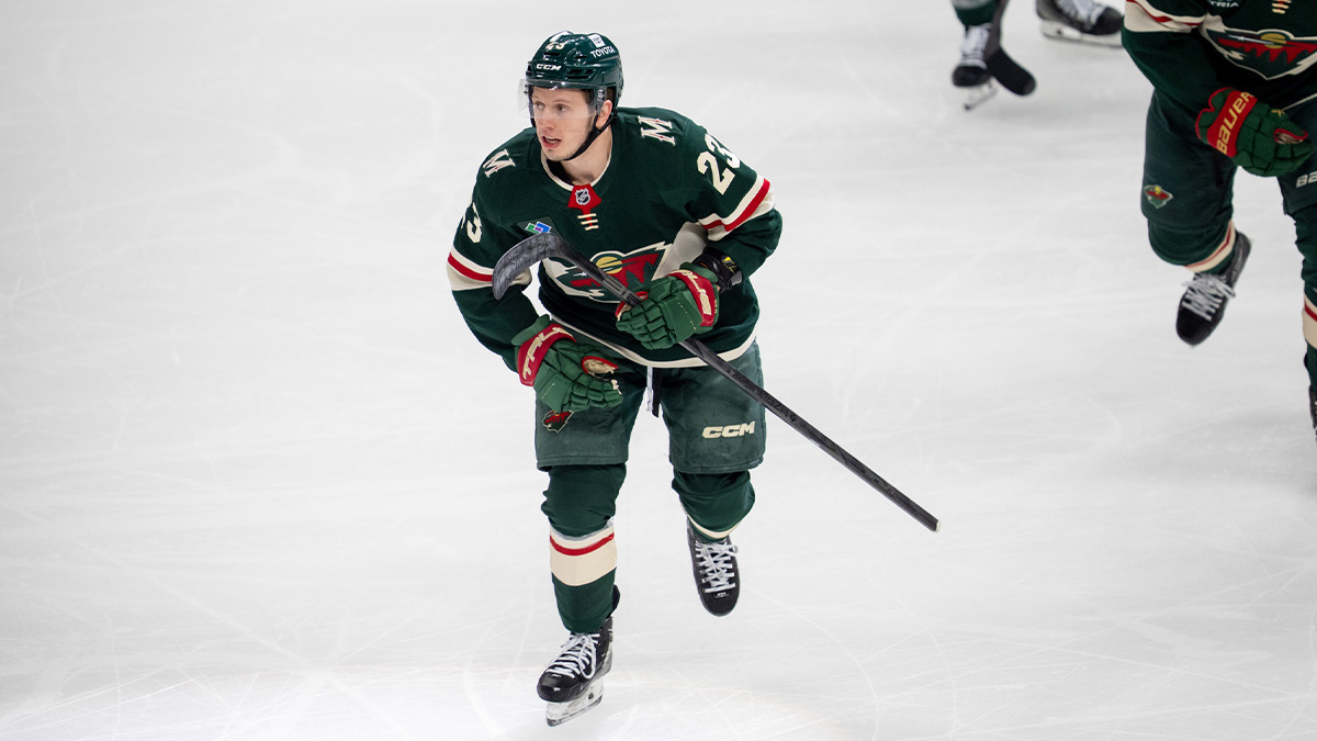 Minnesota Wild center Marco Rossi (23) leads the team to the bench after scoring against the Vegas Golden Knights in the first period in game three of the first round of the 2025 Stanley Cup Playoffs at Xcel Energy Center.