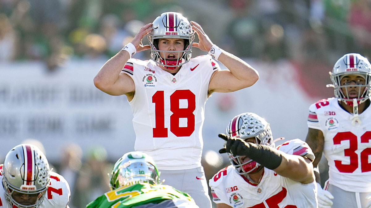 Ohio State Buckeyes quarterback Will Howard (18) motions at the line of scrimmage during the College Football Playoff quarterfinal against the Oregon Ducks at the Rose Bowl in Pasadena, Calif. on Jan. 1, 2025. Ohio State won 41-21.