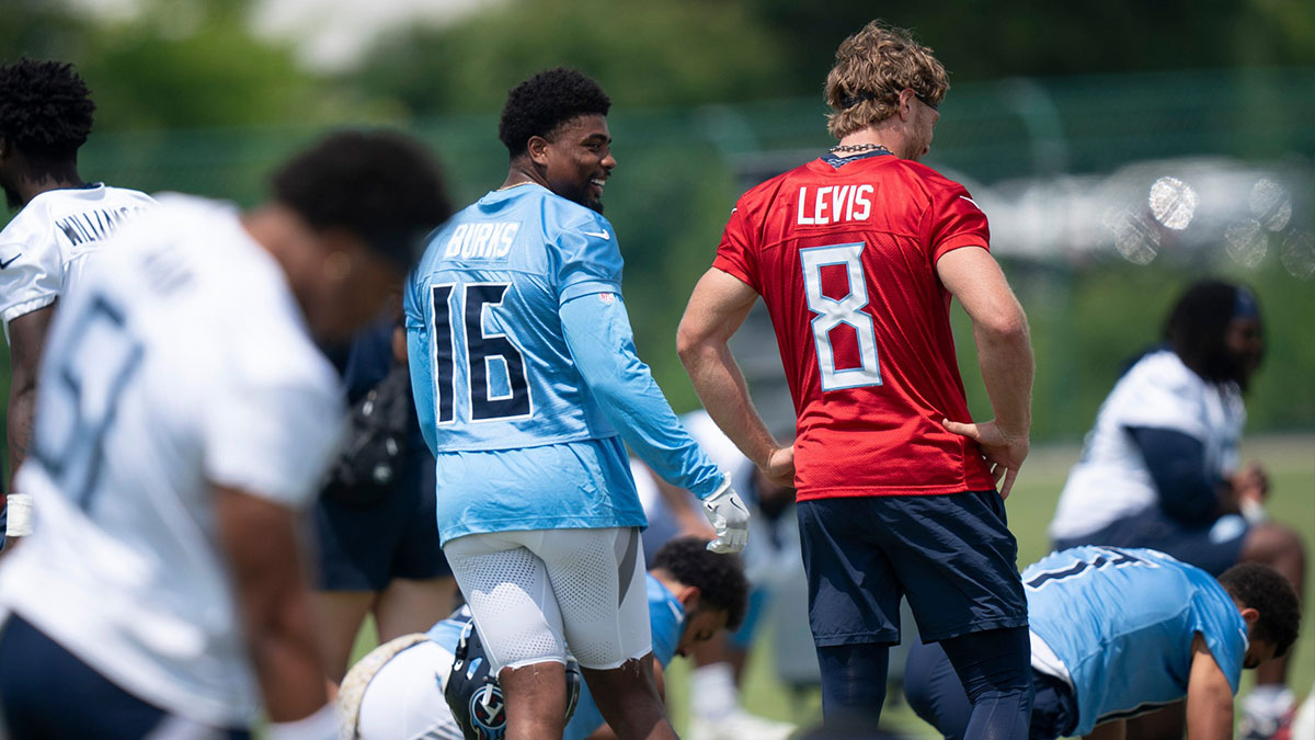 Tennessee Titans Treylon Burks (16) and Will Levis talk as stretching begins during OTAs at Ascension Saint Thomas Sports Park in Nashville, Tenn., Tuesday, June 3, 2025.