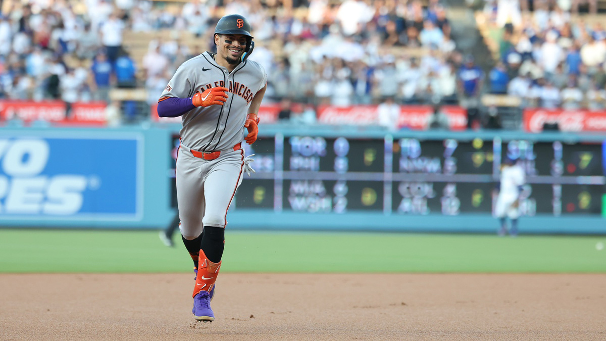 San Francisco Giants shortstop Willy Adames (2) rounds the bases after hitting a solo home run during the first inning against the Los Angeles Dodgers at Dodger Stadium.