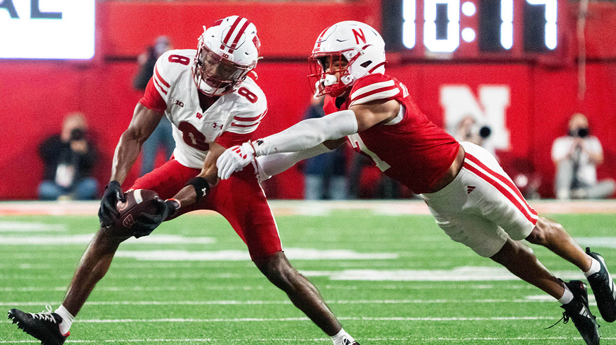 Wisconsin Badgers wide receiver Vinny Anthony II (8) catches a pass against Nebraska Cornhuskers defensive back Malcolm Hartzog Jr. (7) during the fourth quarter at Memorial Stadium.