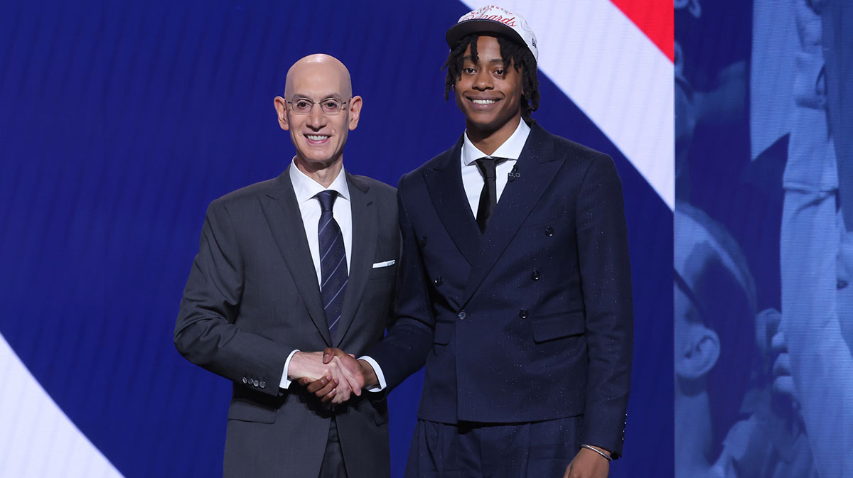 Tre Johnson stands with NBA commissioner Adam Silver after being selected as the sixth pick by the Washington Wizards in the first round of the 2025 NBA Draft at Barclays Center.