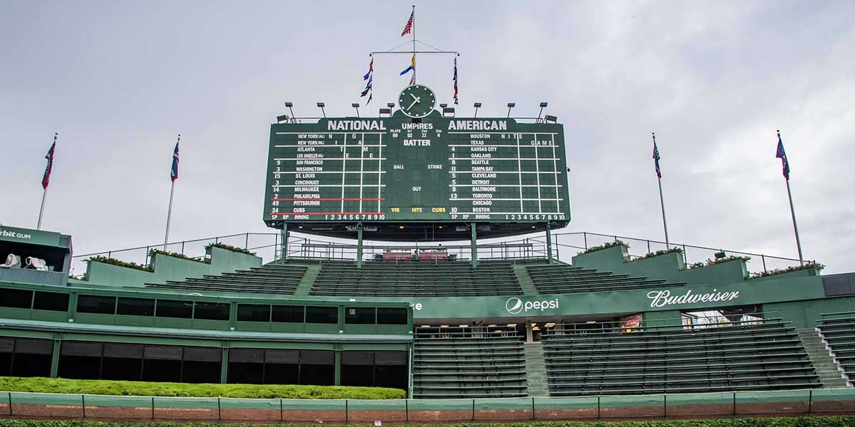 Jun 9, 2018; Chicago, IL, USA; The ivy covered brick outfield wall with the scoreboard is seen prior to a game between the Chicago Cubs and the Pittsburgh Pirates at Wrigley Field. Mandatory Credit: Patrick Gorski-Imagn Images