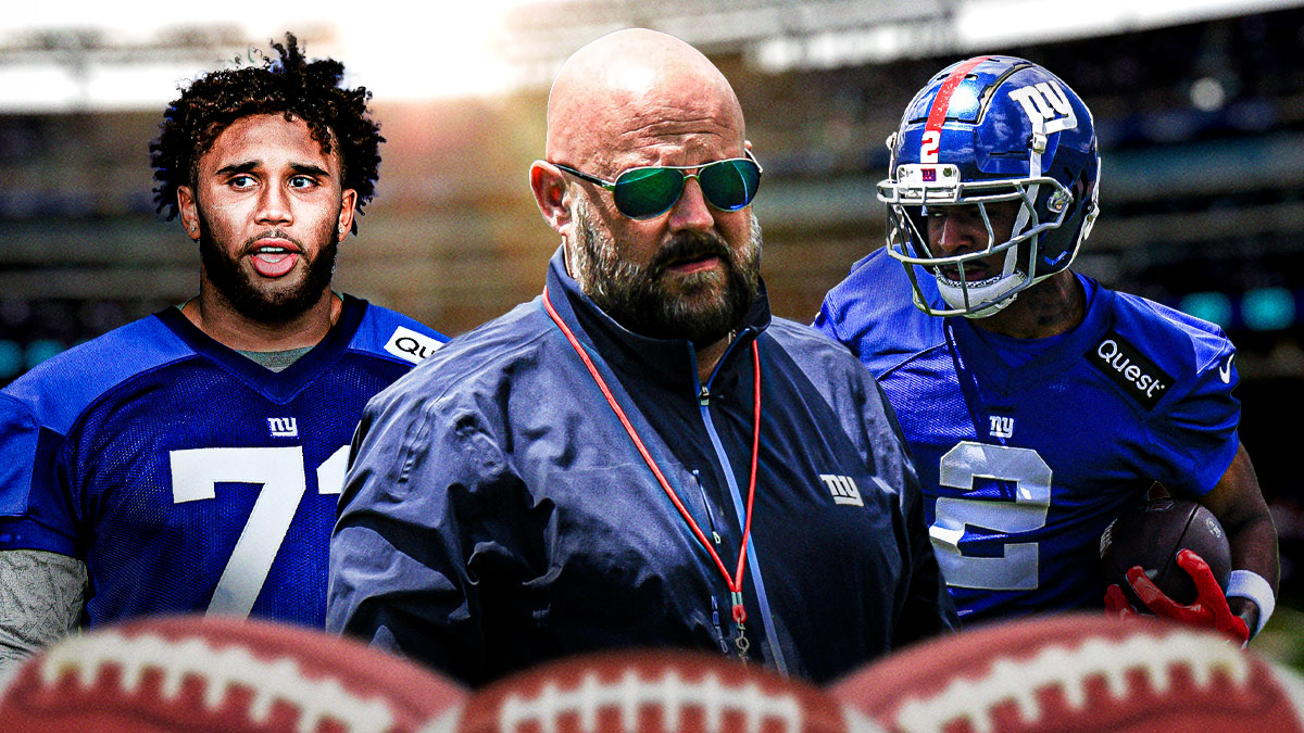 Giants coach Brian Daboll (center) with Purdue guard Marcus Mbow (left) and Ole Miss receiver Antwane Wells (right)