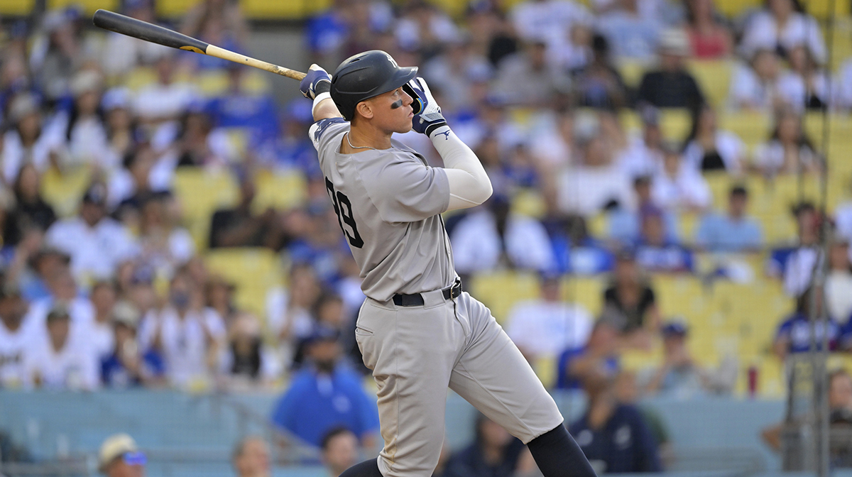 New York Yankees designated hitter Aaron Judge (99) watches the flight of the ball on his second solo home run of the game in the eighth inning against the Los Angeles Dodgers at Dodger Stadium.