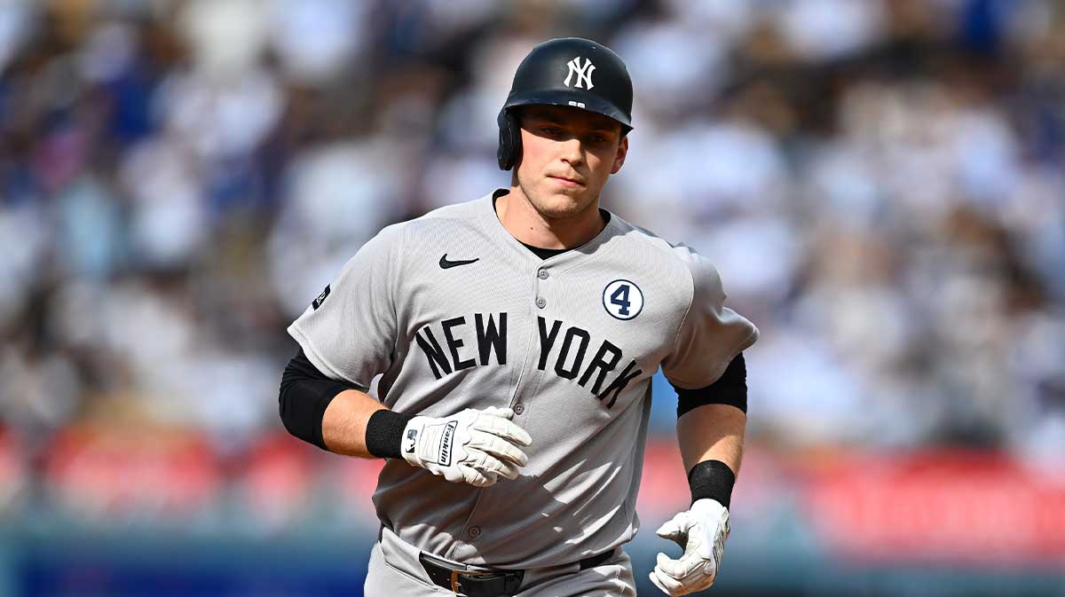 New York Yankees designated hitter Ben Rice (22) rounds the bases on a two-run home run against the Los Angeles Dodgers during the third inning at Dodger Stadium.