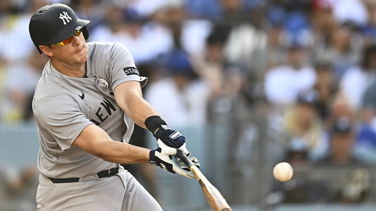 New York Yankees second baseman DJ LeMahieu (26) hits an RBI single against the Los Angeles Dodgers during the fifth inning at Dodger Stadium.