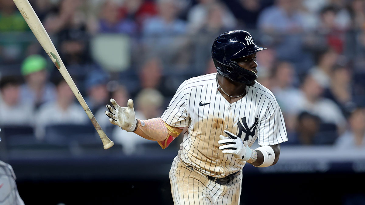 New York Yankees third baseman Jazz Chisholm Jr. (13) watches his RBI single against the Cleveland Guardians during the seventh inning at Yankee Stadium.