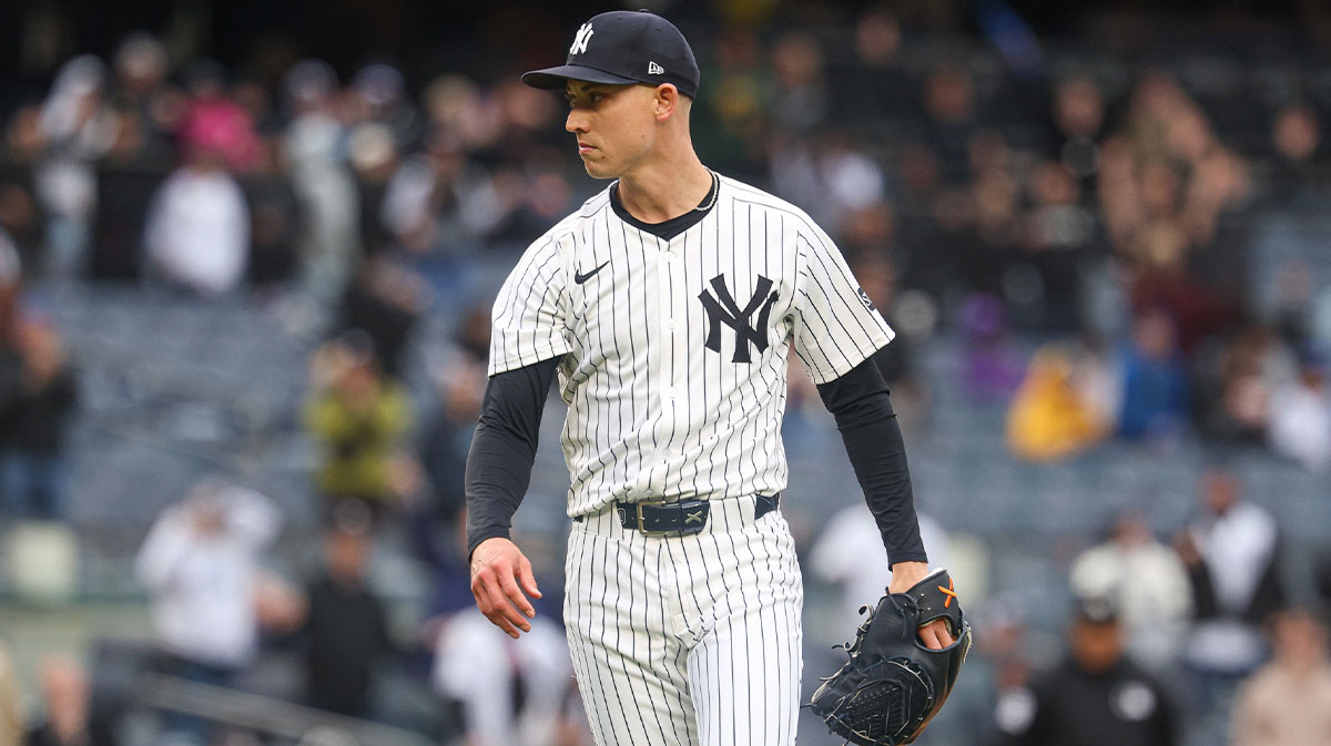 Yankees relief pitcher Luke Weaver (30) reacts after closing