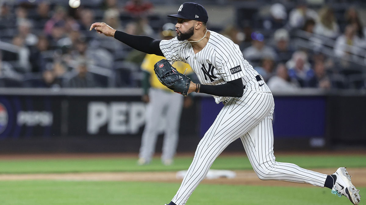 New York Yankees relief pitcher Devin Williams (38) pitches in the ninth inning against the Athletics at Yankee Stadium.