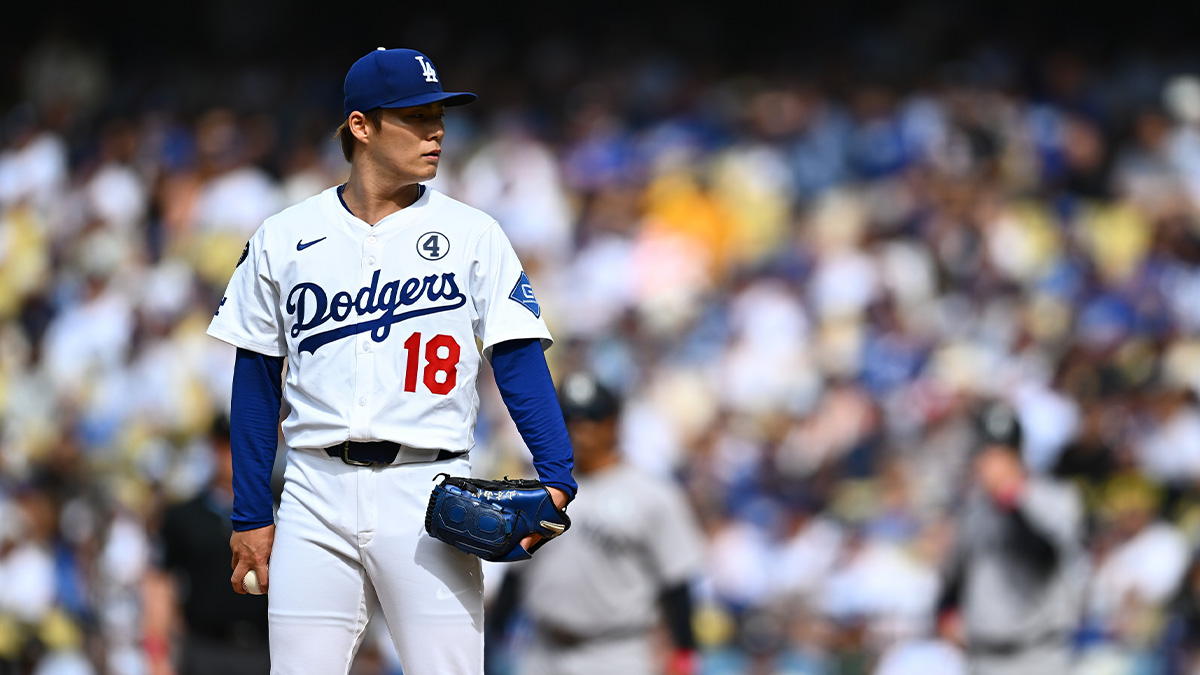 Los Angeles Dodgers starting pitcher Yoshinobu Yamamoto (18) on the mound against the New York Yankees during the first inning at Dodger Stadium.