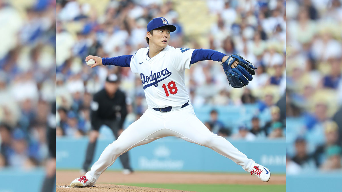 Los Angeles Dodgers starting pitcher Yoshinobu Yamamoto (18) pitches during the first inning against the San Francisco Giants at Dodger Stadium.