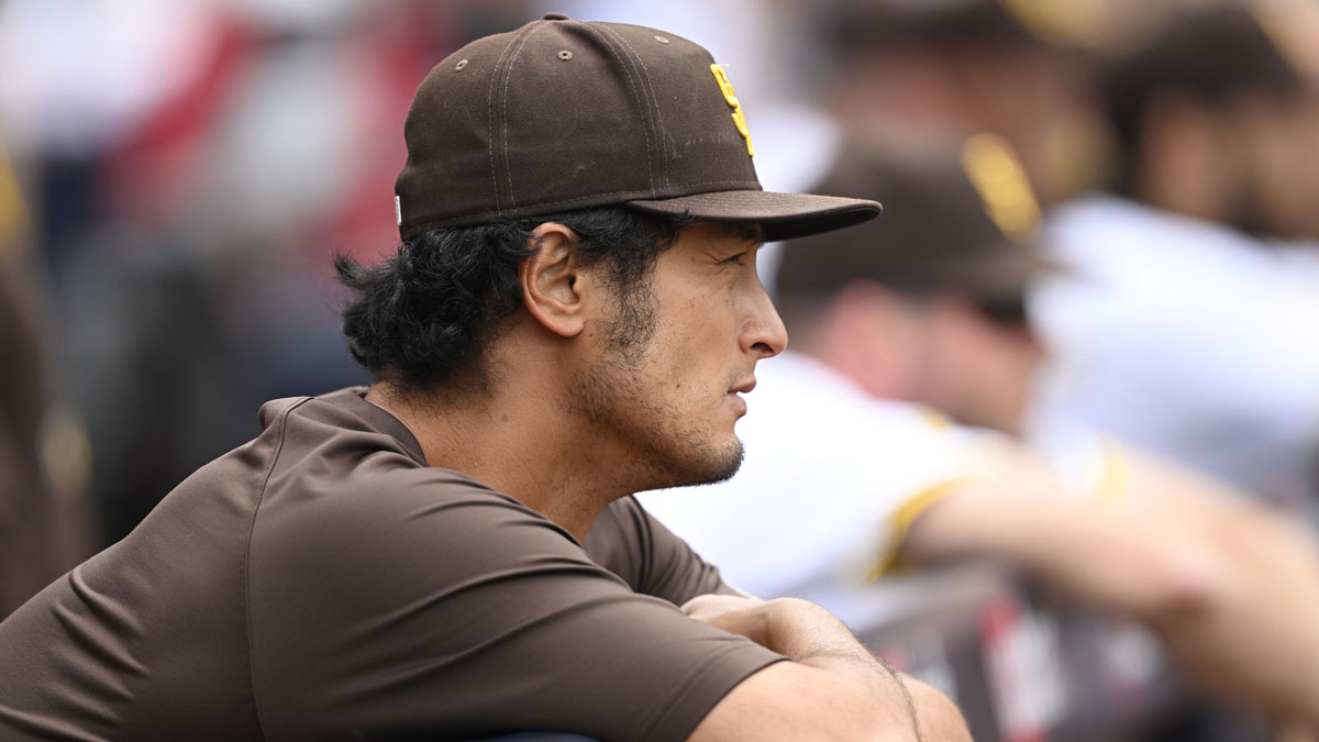 San Diego Padres pitcher Yu Darvish (1) looks out from the dugout during the third inning against the Miami Marlins at Petco Park.