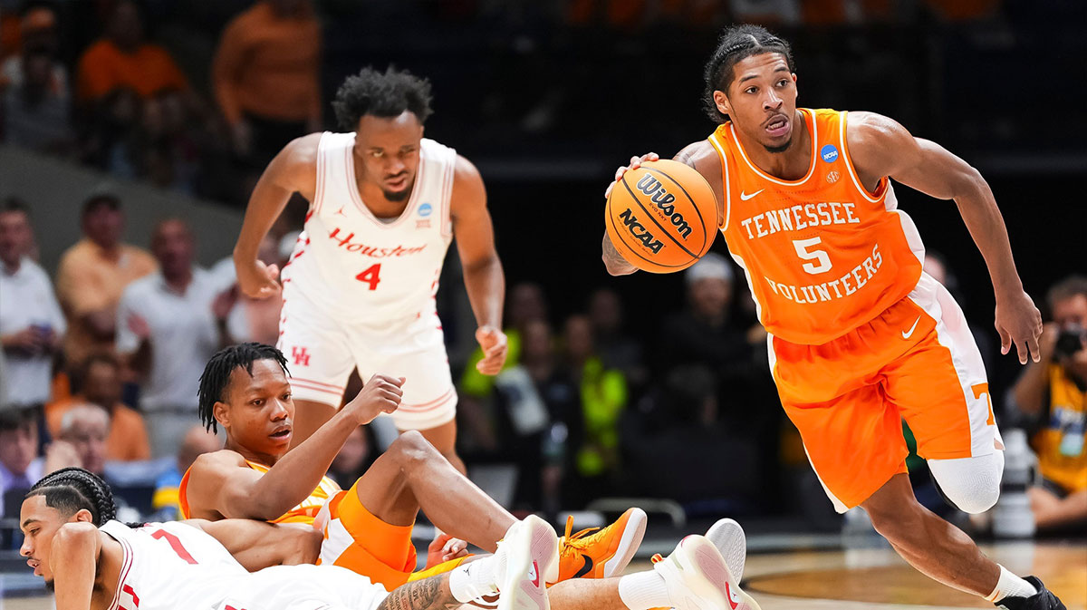 Tennessee guard Zakai Zeigler (5) drives down court during a NCAA Tournament Elite Eight game between Tennessee and Houston at Lucas Oil Stadium