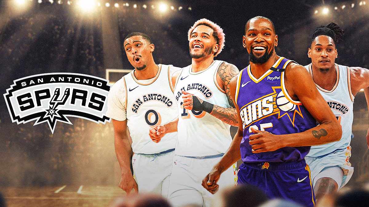 Kevin Durant in the middle, Devin Vassell, Keldon Johnson, Jeremy Sochan around him, San Antonio Spurs logo in the background