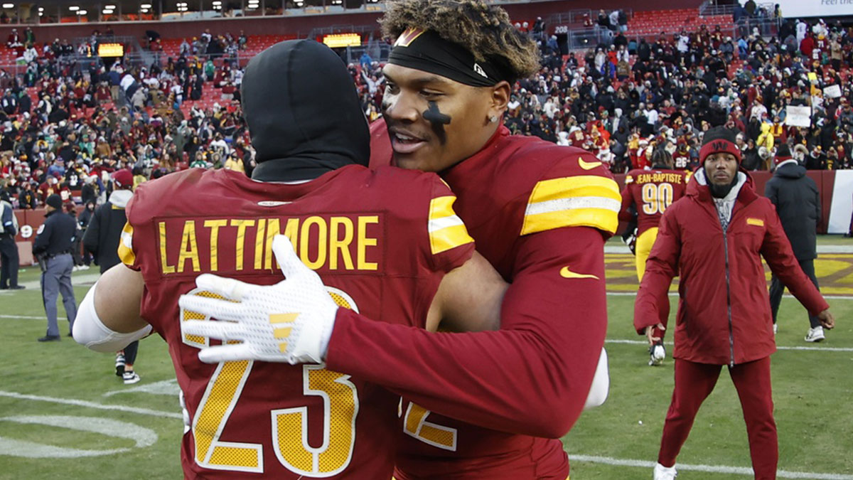 Washington Commanders cornerback Marshon Lattimore (23) celebrates with Commanders linebacker Mykal Walker (32) after their game against the Philadelphia Eagles.
