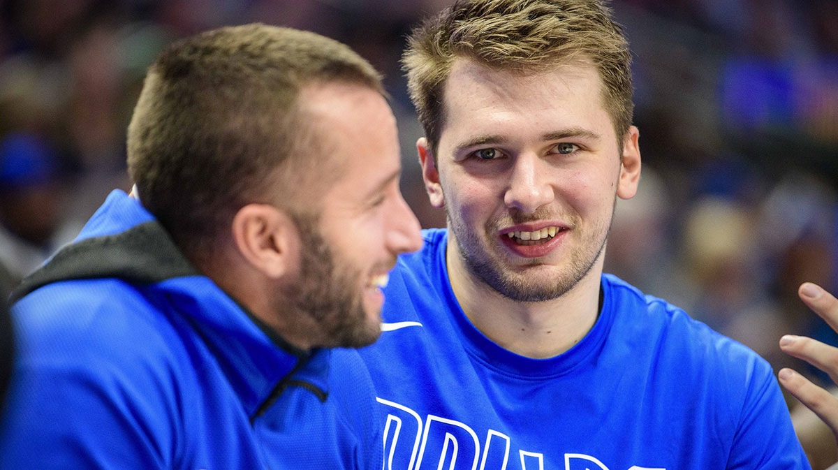 Dallas Mavericks guard J.J. Barea (left) and forward Luka Doncic (right) during the game between the Mavericks and the Warriors at the American Airlines Center.