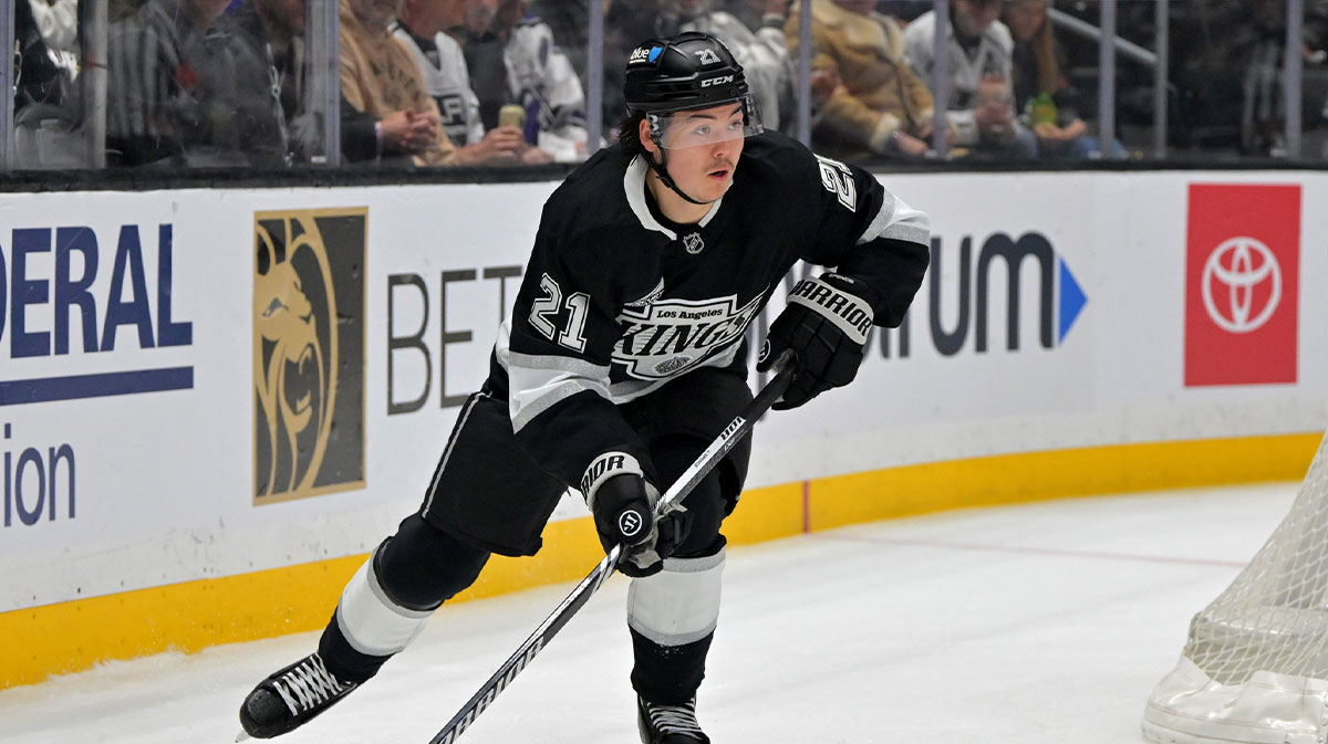 Los Angeles Kings defenseman Jordan Spence (21) handles the puck during game 2 of the 2025 Stanley Cup Playoffs against the Edmonton Oilers at Crypto.com Arena.