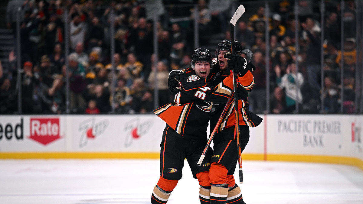 Anaheim Ducks center Trevor Zegras (right) celebrates with defenseman Jamie Drysdale (34) after scoring a goal against the Boston Bruins during the third period at Honda Center.