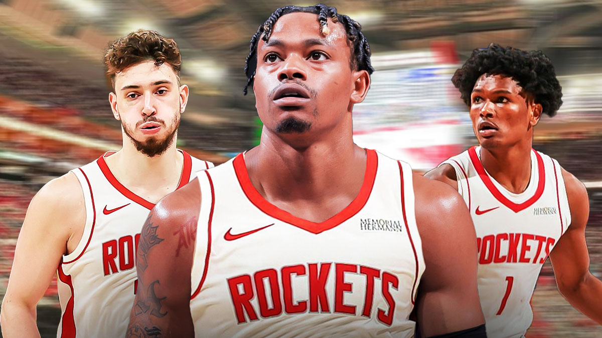 Adonis Arms wearing a Houston Rockets jersey in the middle, Alperen Sengun and Amen Thompson around him