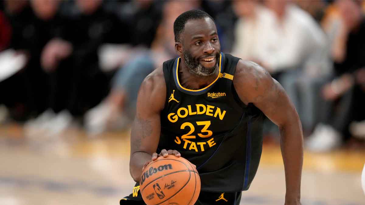 Golden State Warriors forward Draymond Green (23) dribbles the ball against the Minnesota Timberwolves in the fourth quarter during game four of the second round for the 2025 NBA Playoffs at Chase Center.