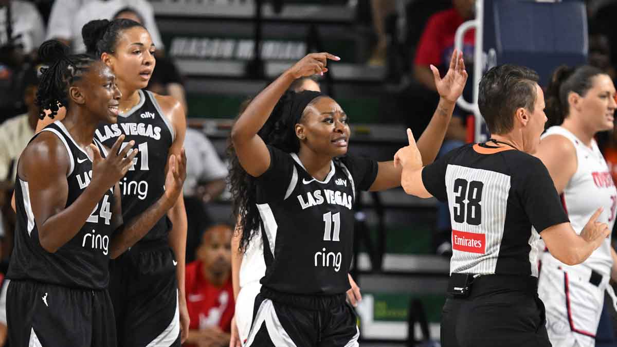 Las Vegas Aces guard Dana Evans (11) and guard Jewell Loyd (24) react to a foul against the Washington Mystics during the second quarter at EagleBank Arena.