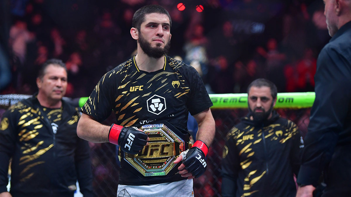 Islam Makhachev (red gloves) reacts after defeating Renato Moicano (not pictured) in a lightweight title fight during UFC 311 at Intuit Dome.