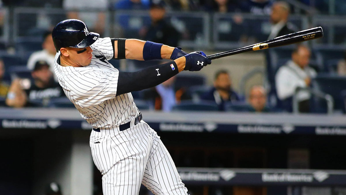 New York Yankees right fielder Aaron Judge (99) hits a two run home run against the Chicago White Sox during the fifth inning at Yankee Stadium.