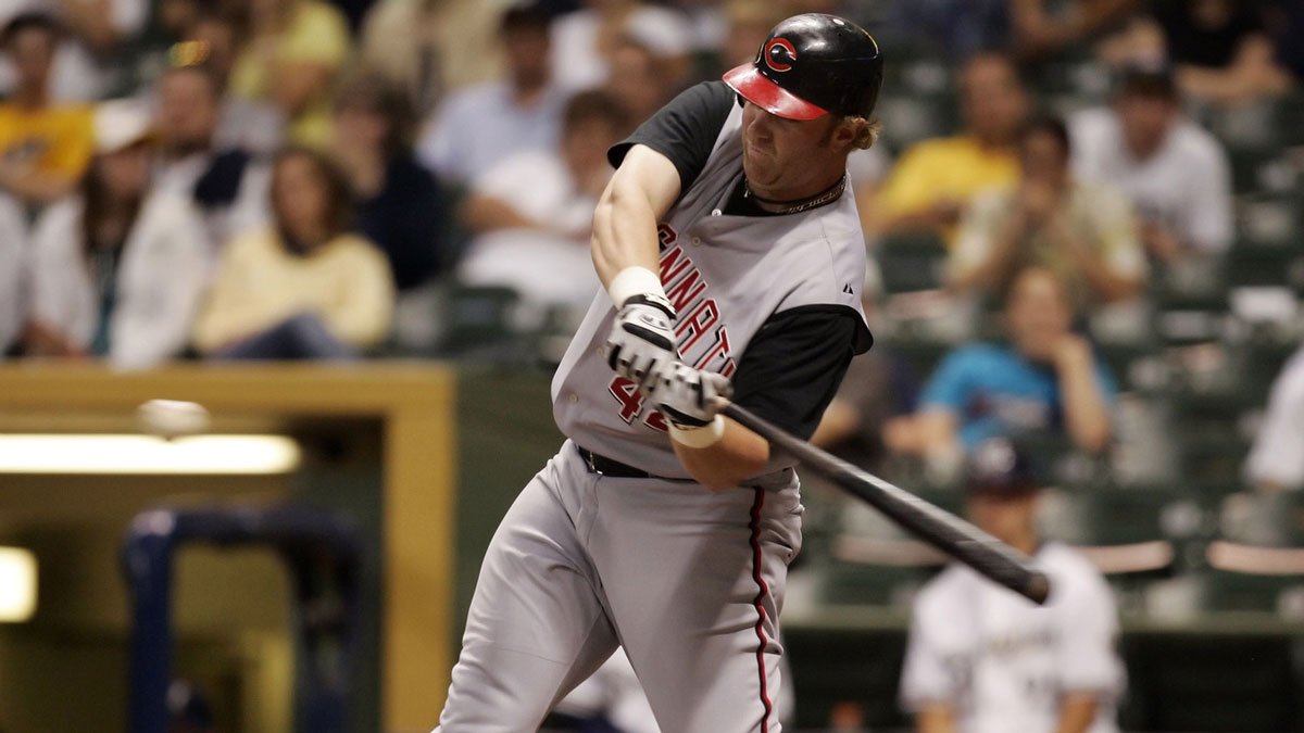 Cincinnati Reds right fielder #44 Adam Dunn hits a home run during the tenth inning against the Milwaukee Brewers at Miller Park.