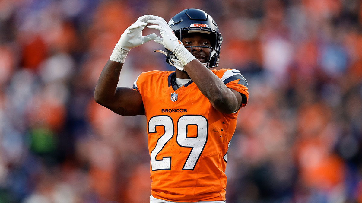 Denver Broncos cornerback Ja'Quan McMillian (29) gestures in the third quarter against the Indianapolis Colts at Empower Field at Mile High.