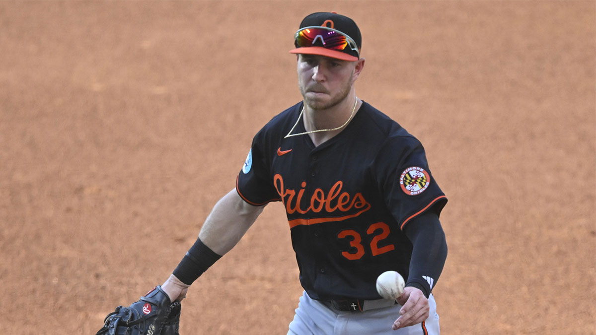 Baltimore Orioles first baseman Ryan O'Hearn (32) tosses the ball to first base in the second inning against the Cleveland Guardians at Progressive Field.