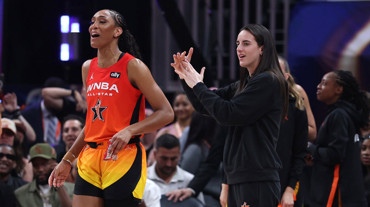 Team Clark guard Caitlin Clark (22) and center A'ja Wilson (22) react on the bench in the fourth quarter against Team Collier the 2025 WNBA All Star Game at Gainbridge Fieldhouse.