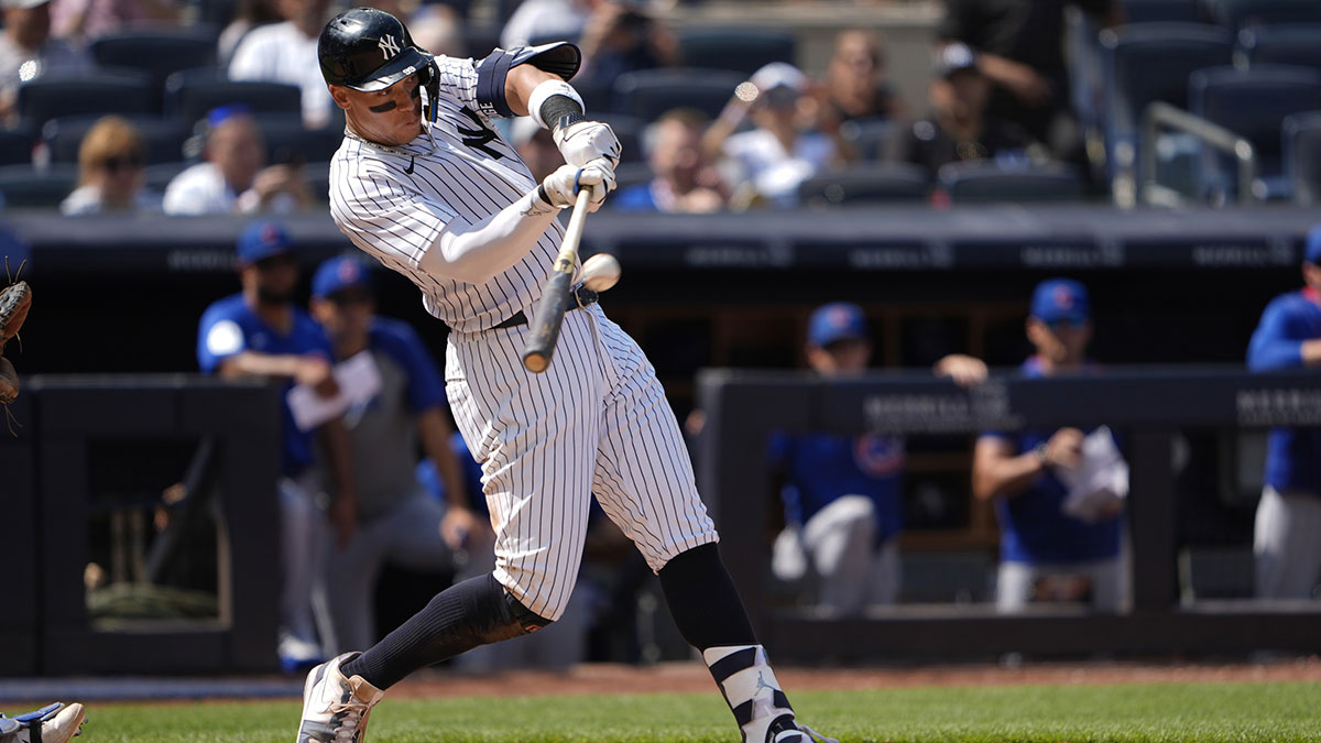 New York Yankees right fielder Aaron Judge (99) hits a two run home run for his 350th career home run during the ninth inning against the Chicago Cubs at Yankee Stadium.