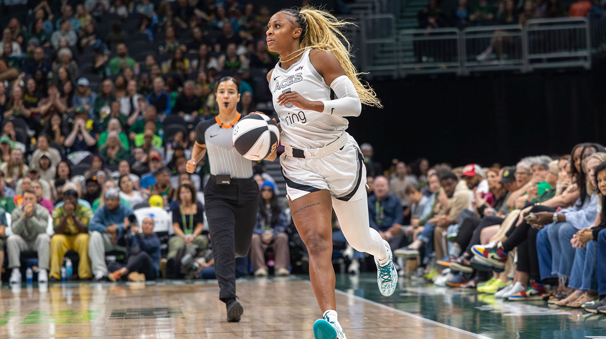 Las Vegas Aces guard Tiffany Mitchell (3) dribbles the ball against Indiana Fever in the third period at Climate Pledge Arena.