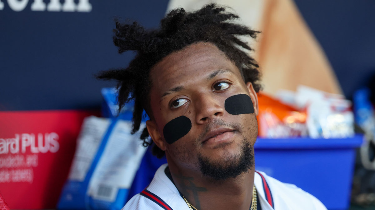 Atlanta Braves right fielder Ronald Acuna Jr. (13) in the dugout against the Los Angeles Angels in the second inning at Truist Park.