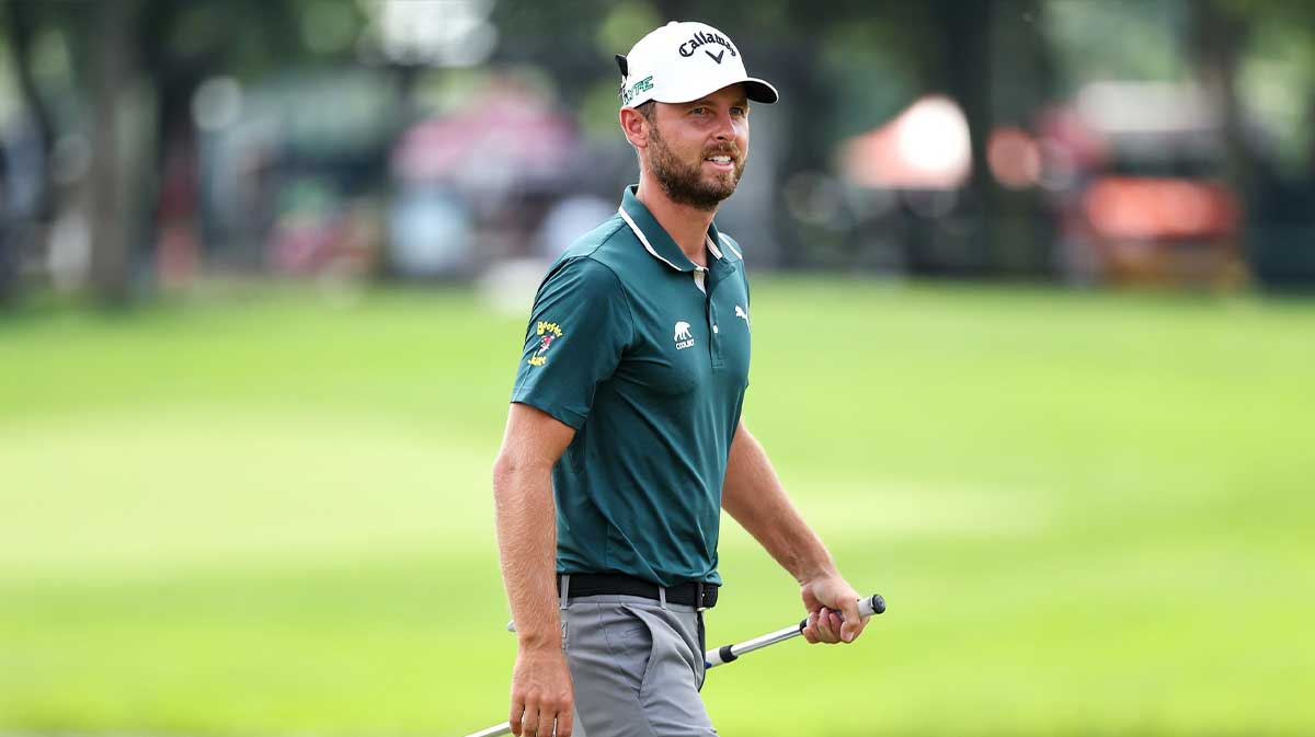 Adam Svensson reacts to his eagle on the 18th green during the first round of the 3M Open golf tournament.